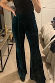Wore to my company holiday party. I fall between a small and medium in these pants but after reading reviews went with the medium. Waist ended up being too big and would have sized down. Very comfortable and received multiple compliments. Does have a sheen with flash if that bothers you. - Kaylee E.