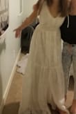 The dress is for my 12 yr old daughter as pictured. The material is light but the liner is perfect helping it not be see through. She feels so pretty, she is wearing the dress to a beach wedding, not happened yet so we do not have another picture yet. - Suzanne G.
