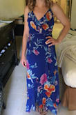 Material felt great and nice quality, very comfortable. I wore it to a destination beach wedding and got lots of compliments! Love the wrap dress, it makes it very adjustable to any size, the straps are adjustable also. Wore a sticky bra to avoid bra straps and seeing it from the size in the armpit. Will definitely purchase more wrap dresses from Lulus! Tip for the wrap dress is the small hole on the inside to stick the string though to tie it up. - Ashley F.