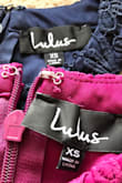 I originally ordered the navy blue in a small and it ended up being way too big. I had about an in if room in the bust on each side and it fit loosely everywhere else. I returned it and ordered it in an XS and ordered the Magenta one as well. Blue fit pretty well but the Magenta I had to put it over my head to get on and couldn't pull it down all the way! I struggled for about 15 minutes just trying to get the thing off and was starting to worry I'd have to CUT the dress off. The dresses are pretty and good quality but PLEASE fix your sizing! - Ellie S.