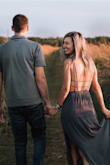 I do love this dress! It's actually long enough and surprisingly stays up with my small chest. The grey one was tight enough but the elastic on the green one was too big and I had to get it altered. I like that it can be casual or dressed up! - Morgan N.
