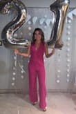 I bought this jumpsuit for my 21st birthday outfit for going out with friends and I loved it! I originally ordered a size small but it was very big on me, so I returned for an XS. Even the XS was a bit baggy in the top and it was a bit long on me. I had to get it altered a bit at the top and some material taken off the bottom, but after that was taken care of it looked great! It's very comfortable and great quality. The only thing I would recommend is going a size down, especially if you're shorter like me. Great buy though, I definitely recommend! - Alexis Y.