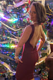 Wore this to a work Christmas party and got tons of compliments. Only trouble was seam down middle of back of skirt kept creeping off center (there is a seam in slip under layer too). - India S.