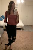 I really like the fit of this top! It's soft and I got a lot of compliments wearing it to a concert the other night. I will say it's a little shorter if you're on the tall side, so I'm making sure to air dry it so it won't shrink! - Victoria S.