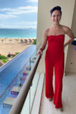 I wore this to a wedding in Cancun and got so many compliments. It fit me pretty well overall, which is lucky, because I didn't have time to get it tailored before the wedding. Luckily my partner and the wedding-goers couldn't see the tiny ways it needs adjustments. I have super small boobs and usually prefer to go braless with jumpsuits, but the chest area on this was baggy even in the small, so I had to wear a padded push-up bra to fill in the extra space (lolll). It's a *tiny* bit too long in the torso too, so it would bunch a bit in the back around the zipper and I'd have to pull it up higher to flatten it out. Since the torso was long, it also hung a little low in the crotch. I wore 3-inch wedges with it and think it could still be an inch shorter. These are all minor adjustments I'll make before the next wedding. One thing I can't change: the legs are double-lined, and I run hot, so I sweat A LOT on the outdoor dance floor in Cancun... so be prepared! ;D - Josephine Y.