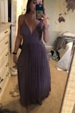 I love the fit of the dress!! Very flattering! The only thing is the purple is darker in person than online but it's still a really pretty color. - Anna C.