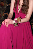 I bought this for prom last year and the color is far more pink than I expected from the picture. I had to get it altered as well and there was excess fabric on one side according to the seamstress I went to. Though the dress ultimately looked great, it wasn't what I expected at all. - Anna S.