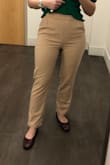 These trousers are more appropriate for spring/summer, because they are very light and don't keep you warm when it's cold. I am usually a small but sometimes order size M for bottoms so that I don't get uncomfortable at work when sitting most of the time. M fits a little loose but still good, but the front of the trousers looks a little weird for some reason and I am not sure what causes that. Still happy with the purchase! - Alexandra M.