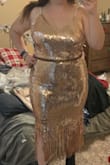 Beautiful dress and great quality. Ran large, but had a good stretch. If you are pale skinned like me the rose gold color is very flesh tone. Also I am short and the dress ran longer in the straps but had adjusters. It is probably better for someone taller than 5'3". - Celina E.
