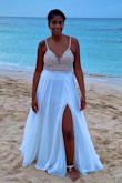 Perfect option for my beach vow renewal. The photos don;t do it justice, the way the rhinestones & pearls sparkle is amazing! I did have a few alterations done to it. The top was a little saggy so I had the straps taken in, replaced the cups with sturdier ones and had a slit added. It was perfect on my ceremony day. My only complaint is that 30 minutes into my ceremony, I noticed beads were hanging from it in 2 spots. It only showed up in one of my pictures though so it ended up being okay. - Naphia S.