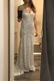 Beautiful dress & it was a strong contender but I ended up deciding on a different Lulus dress to use for my wedding. It fit pretty well & good quality although it may have been a tad large & was way too long (both are typical for me because I am petite). Would have kept if it were a pure white instead of off white. - Nora R.