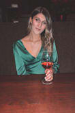 It's a gorgeous color and material, and exactly what I wanted for an anniversary dinner with my husband! The only thing is that I kept having to pull the bottom of the sleeves with my hands so that it would be more 'off the shoulder' otherwise it would drape so much in the front and show my bra (I wore a plunge bra with this). I may need to use double sided tape next time I wear it to avoid this. Also if you have a long torso make sure you have very high waisted pants as it is quite short! The sleeves were a good length for me but I do have long arms. - Brenna K.
