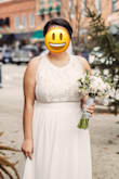This dress was absolutely amazing for my wedding!! I was really nervous about fit but it made me look beautiful. It photographed beautifully and I only had to get it hemmed a little. The photos don't do justice for how nice the dress looks in person. Your bra will show in the side panel but that wasn't an issue for me - I probably could have hidden it by adding more fabric but decided not to. The fabric was really nice and I got so many compliments on it. No one could believe I spent less than $100! - Rachel W.