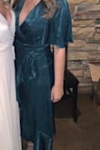 I absolutely love this dress. It fit true to size and was super comfortable. The top was a little big if you are smaller up top but you could easily pin it if needed. I wore this to a winter wedding rehearsal and the color was just perfect for winter. I received many compliments on the color. This dress is exactly as pictured! - Amanda K.