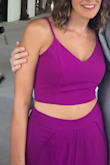 I wore this to a wedding and it was super hot outside, so it was perfect. The back tie thingy is easy to adjust. The pants are super fun, but they were a little awkward to sit in. The slits go aaaalll the way up. So be ready to show some skin.
Update: I wore this again on a beach trip and it was perfect again! I'm in love with this outfit. I danced all night and it was such a hit. The fabric on the top is thicker and stays put while your moving and grooving. So good! - Sarah D.