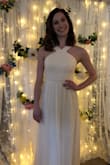I ordered this dress when it was on sale for my bridal shower, and it was beautiful. I got so many compliments! It was much heavier than I was expecting and seems to be good quality. I wore a strapless bra underneath as it was a little see through, which made the bust area a little tight, but it wasn't distractingly uncomfortable. I would have benefited from having it hemmed an inch or two, but I was super happy with how it fit overall! - Laura P.