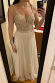 Lovely dress with intricate beading, not heavy at all, the perfect amount of bling. Fits true to size, with a very flattering A-line skirt. Love the low back. Provides plenty of coverage and fills out nicely even if you are modest on top. Decided to return and keep a different dress instead, and thus did not have a purpose for this, sadly. If you are thinking about buying this dress DO IT. - Michelle K.