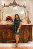 I ordered this dress for a work holiday party and I fell in love with the details of the dress as well as the color! The design was very flattering. I had ordered this in an XL and felt it to be a flattering fit, it wasn't too tight and wasn't too loose. The length wasn't too long, yet still sexy enough to show some leg. A few strands of the beading had come loose after dancing around for a few hours, however expected lol. I received many compliments while wearing this dress, definitely worth the price! - Adrielle E.