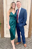 This dress fit perfectly. It is a gorgeous color (I thought it was true forest/emerald green) and a very flattering fit. - Sarah W.