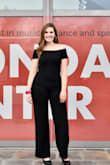 I love this jumpsuit! Being tall, I was nervous about the fit, but it fit my torso well and was actually long enough for my legs. The sleeves stay up nicely, and it's not so tight that it's uncomfortable. I think it's super flattering and would definitely recommend it! I've worn it for two stage performances now and have received many compliments on the outfit. - Sarah K.