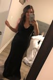 The material on this dress is so soft and stretchy! I am on the shorter side so I will have to have some of the length taken off, but other than that I am extremely happy with my purchase! - Halee T.