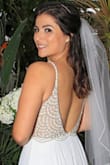 After reading the reviews and looking at the pictures, I decided to purchase this gown for my courthouse elopement - I wasn't going to wear a dress, but changed my mind after realizing that I really wanted to feel like a bride... again (this is both my and his second marriage). I normally wear a size 4P, but chose to buy a size 2 per the recommendation of many of the reviews on this dress, and I'm glad I did. - Renata D.