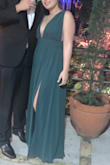 Was way too long but was to be expected as I am so short but was a little large under the bust, probably would've fit a small.
But overall, I loved it and got many great compliments all night.
** put some double sided tape under the breast area so it wont seem too big*** - Eliana M.
