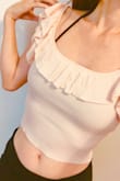 I really like this Ruffled Ribbed Tank Top. My husband complimented me with this top a lot! I think this color looks better on me. It is cropped tank so if you are tall, you might feel so short. - YUKO J.