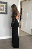 My daughter wore this dress for a Navy Ball. The dress is beautiful and elegant. It is beautiful and elegant and fit perfectly on my daughter. - Gina J.