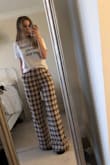 I love these pants. They're super comfy and heavy material. They're definitely long and I'll need to hem if I want to wear with flat shoes. I'd say they run a teensy bit big but not enough to size down. - Mara L.