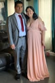The color of this dress is so beautiful in person and the dress is so flattering. I did have to use tape to keep the dress in place in the bust area but that wasn't too bad. I will say the dress is long but It didn't bother me. - Wendy H.