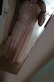 I love this dress! I'm from Europe and normally wear size M (36/38) but I had a feeling to order this one in L and it was a good idea. It fits perfectly and the fabric feels great on the skin. It is a heavy dress so it doesn't float up or anything. The mesh on the bust is very good work and has a very high quality over all. It is kinda long in this size (I'm wearing 8cm high heels in the photos so it reaches just above the floor) - Lisa S.