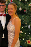 The dress was so cute and fit really well. It was super comfortable to. I didn't need to wear a bra and I wasn't worried about anything falling out. I love the unique design! Got a lot of compliments. - Clare D.