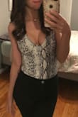 Everyone needs to own this bodysuit. It is very well made. The material is thick so no need for a bra. So cute! I would buy it in other colors/patterns. - Courtney K.