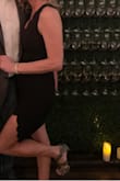 This dress is lovely! It holds you in just enough, but is not uncomfortable. The slit is a little higher than I thought, but it was not too revealing. Overall love the dress! - Melissa N.