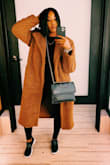 I've been searching for a Teddy coat for months and I finally found the perfect one. I love this coat, I get compliments all the time. It fits true to size and keeps you super warm. - Alaina M.