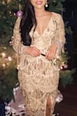 I got so many compliments wearing this dress! It was perfect for our Roaring 20's New Year's Eve party! The dress tapers down and gives you curves in all the right places! - Loni M.