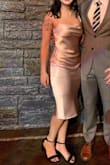 Bought this for my partner's holiday party and it was absolutely perfect. I felt so swanky, and the dress made my body look amazing. I have a small chest and wide hips so I was worried about how the silhouette would look on me but it was bangin'. The material is a little stretchy so it has some give. Beware of any clutches or accessories with sequins or scratchy fabrics because you WILL snag the satin. - Sarah M.