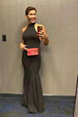 Fit was great! I wore this to a black tie wedding and felt sexy but not at all too much. It was a touch long, but I went for kitten heel comfort instead of a more expected heel height. Forgive the picture, was showing off my "fanny pack" to a friend and forgot to take a better one.... The buttons on the neck were difficult but a hairpin through the loop to get over the button helped a lot. I did not find the neck too loose or too long like some of the other reviewers mentioned. All in all I love this dress and wish I had more occasions to wear it! - KC B.