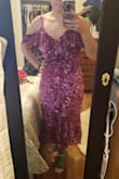 This dress fit much as was expected from the pictures. The color and fabric are beautiful. Unfortunately the length isn't flattering for my shape. I also bought a size up due to other reviews, but i wish I'd ordered my regular  medium. - Becky C.
