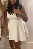 This dress fit so perfectly! The material was nicely thick but also loose enough that looked fantastic when walking! The design made it a little difficult to find a bra that would be inconspicuous but it wasn't too bad and I'm sure most could wear it without a bra with how thick the material is. So happy it came in time for my initiation! - Diana A.