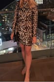 This dress is perfect for any occasion where you need to glisten and shine. It's definitely eye-catching, pictures don't quite do it justice. I am usually an XS in everything but based on other reviews I ordered a small and I'm so glad I did. It fit perfectly. It's a tad short when sitting, but not horrible if you're on the shorter side, and it still was a lot more modest than other New Year's dresses I saw out. Also the sequins seemed to stay put. I didn't notice them coming off at all while wearing. It was the perfect New Year's dress! - Laurel N.