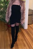 Great dress!!! The material is pretty thick and holds everything in. Super cute shape, the top little detail is quirky too. You can't really see it in the photo but it's there! Highly recommend. - Erina T.