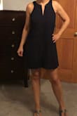 Fits true to size. I am 54 and was a little nervous that it would be too short, but it's perfect! It is a great casual summer dress! - Joy W.