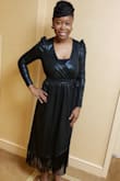 This dress is gorgeous and a steal for the price. The material is like liquid with a very subtle shine. The puff sleeves are a nice touch. The neck is low cut, and I personally would have like a snap closure included but that's a personal preference. Love this dress and looking forward to wear soon. - Terrace G.