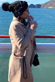 I love, love this coat! Perfect for California Winter weather. It is not thick or heavy. I can wear sweaters and layer this coat on top. For someone petite like myself it was the perfect length. I loved it so much I purchased it in black as well. - Viviana G.