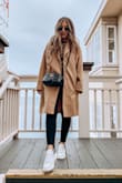 The perfect throw and go! The fit is beautiful and oversized. The fabric is super soft. I packed this coat inside a suitcase and figured it would be a little wrinkled, I was impressed that it wasn't! Amazing quality and perfect fit! - Amy C.