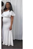 I bought this dress to wear at my baby shower and totally loved it!! I received so many compliments! The dress fit perfectly and accented all of my curves, even my baby bump. It was way too long for me though especially wearing flats. I kinda want another one in my post baby size so I can wear it again! - Andrea J.