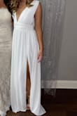 This is one of my favorite dresses! It is a little long even with heels and the straps are a little loose, but if you stand up straight it is fine. Overall loved this dress! - Alison D.