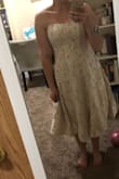 Bought this for a little pre-wedding elopement, and love it! The length is perfect, it fits like a glove, AND IT HAS POCKETS. Will need to steam it before the day comes. 
The base layer is more of a nude than a blush. - Rea M.
